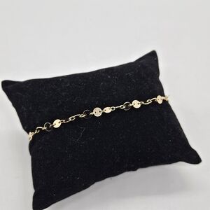 mevecco yellow gold tone flat disk bracelet